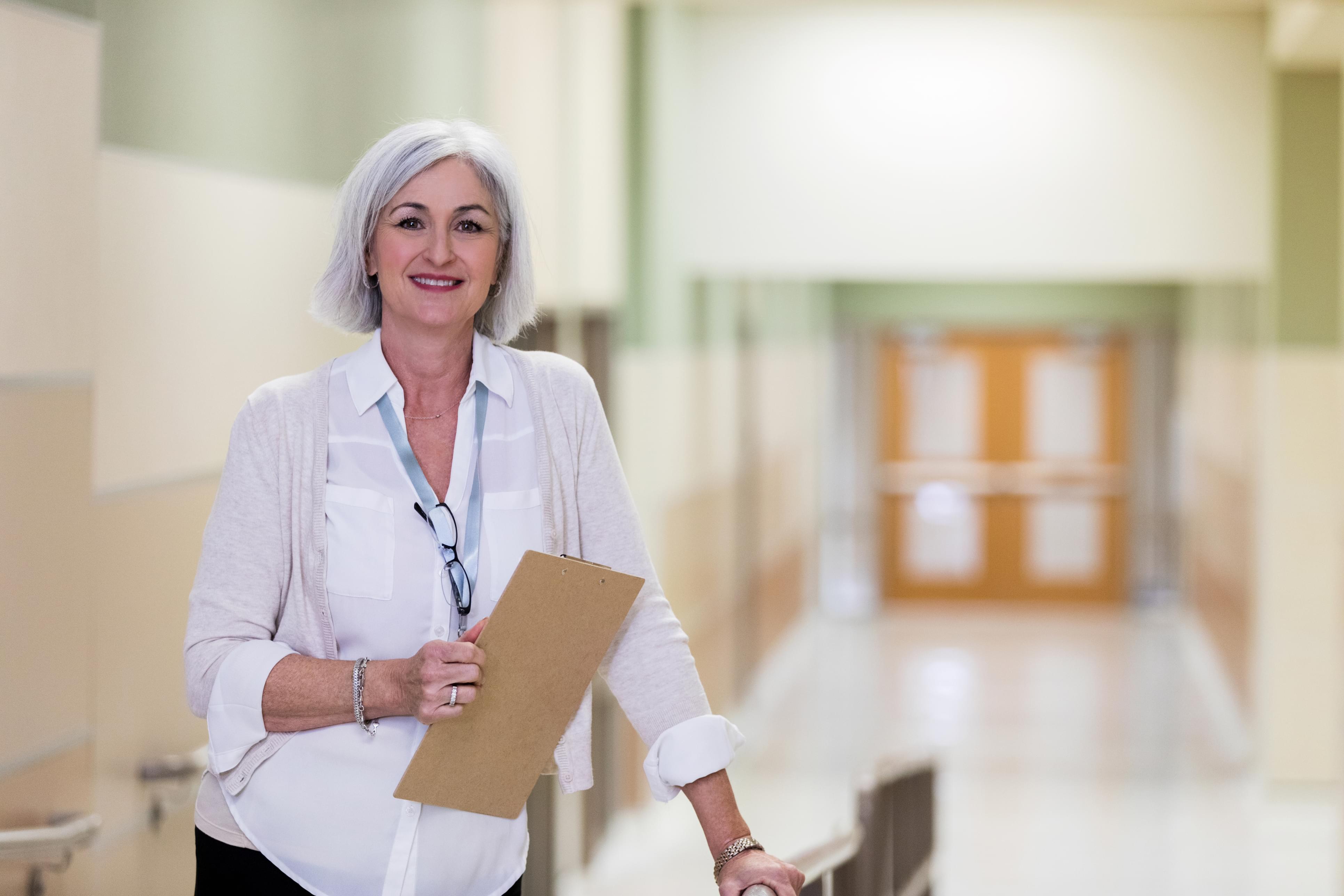 Principal holding checklist looks on